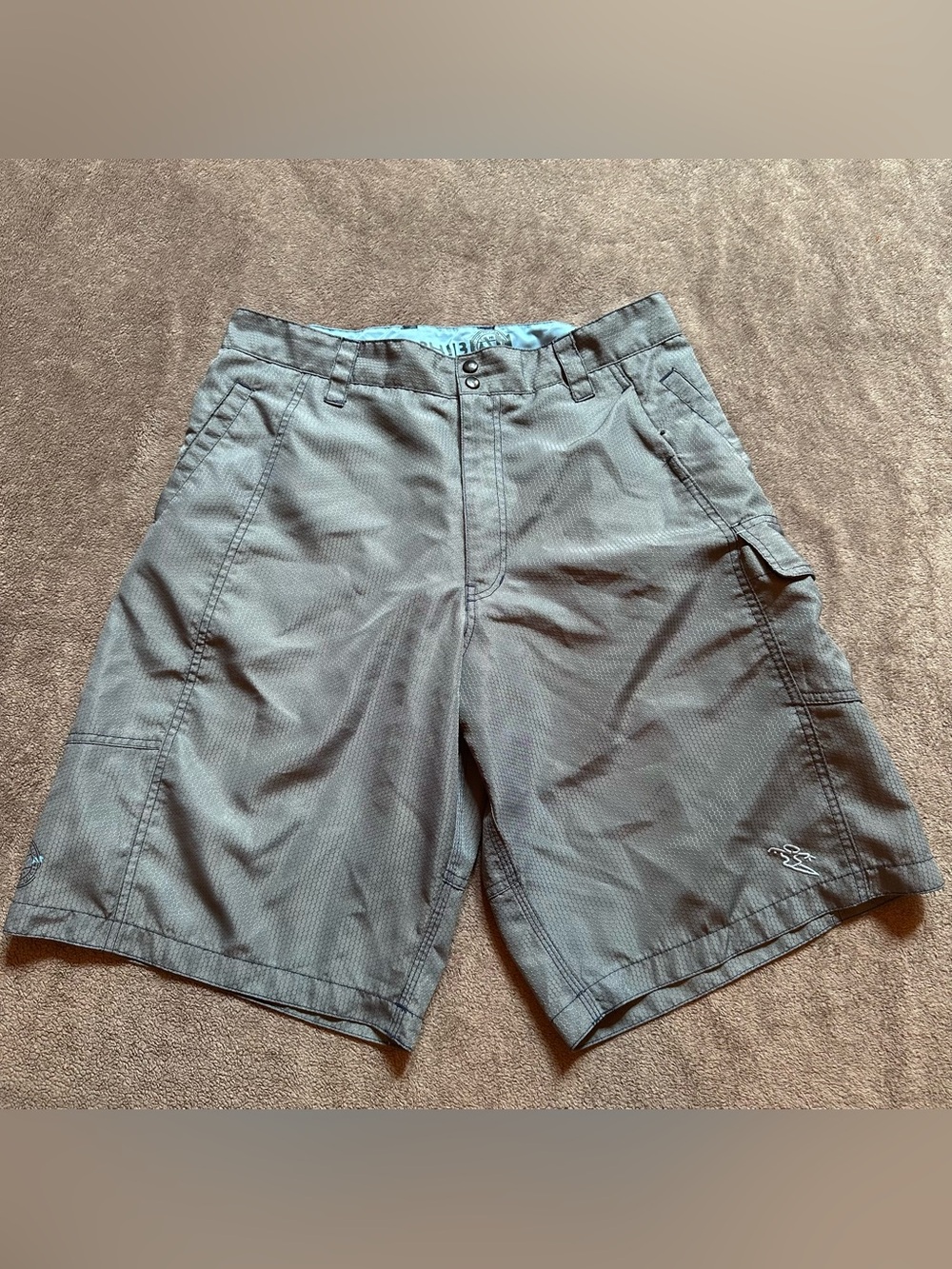 The Da Hui Amphibious Hybrid Cargo Board Shorts in men's size 32 are a versatile